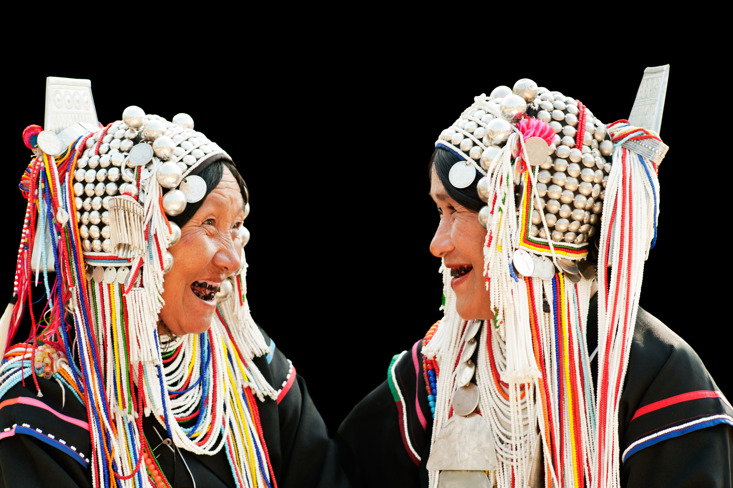 Two Akha woman having a laugh portrait photography idea