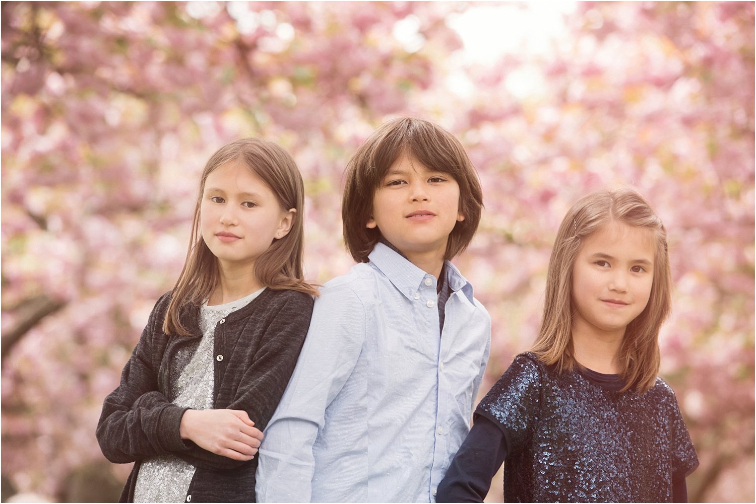 portrait image of three kids