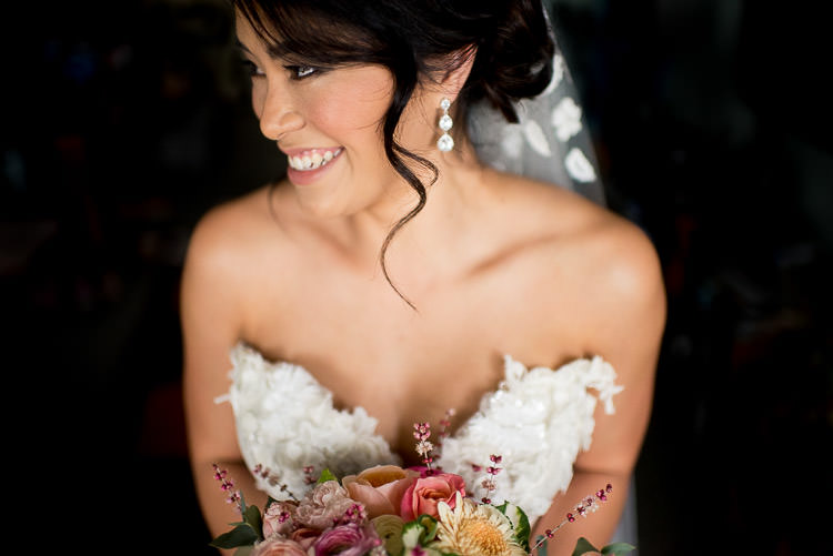 shallow depth of field low-key portrait of a bride