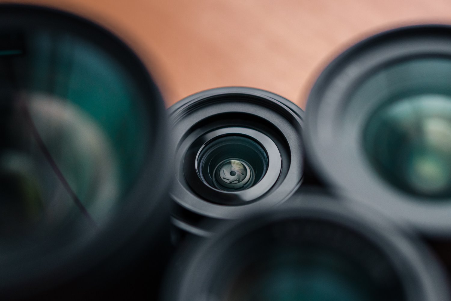 four lenses on a table