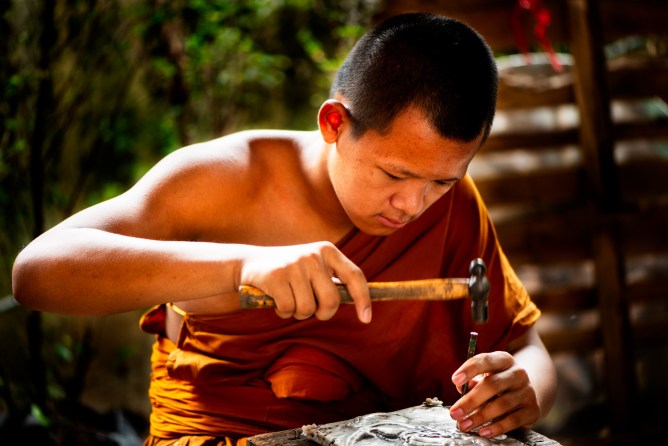 Buddhist monk making art - Tips for Culling Your Photos